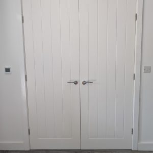 Levland Ltd - Double Auto Doors with Hoist Track