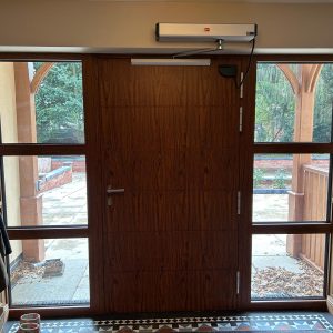 Levland Ltd - Wood Effect Aluminium Auto Door